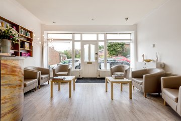 Strands lounge with daylight through the shopfront